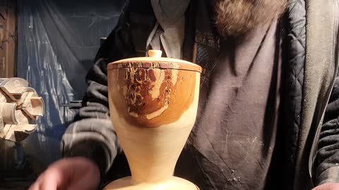 EMERGING LIDDED VASE