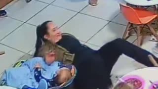 Baby Pulls Chair Before Woman Sits Down
