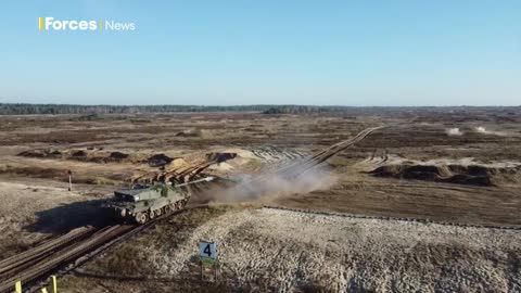 British Army Challenger 2 tanks display firepower alongside allies