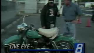 July 26, 1991 - Dick Wolfsie is 'Uneasy Rider' on a Harley