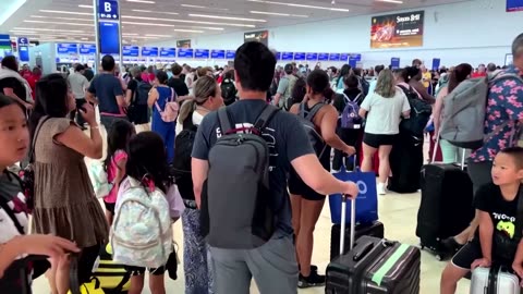 Tourists stranded by storm Beryl pack Cancun airport