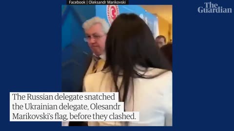Russian man snatches Ukrainian flag and triggers scuffle at Black Sea conference