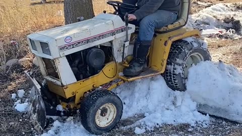 old 2022 video of tim putting his tractor though a snowbank Not YT Synced