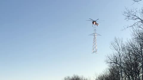 Talented Pilot Shows Amazing Skills Attaching Two Sections Of A Pylon