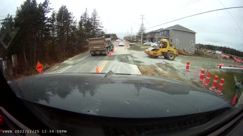 Drivers Ignore Traffic Cones at Construction Site