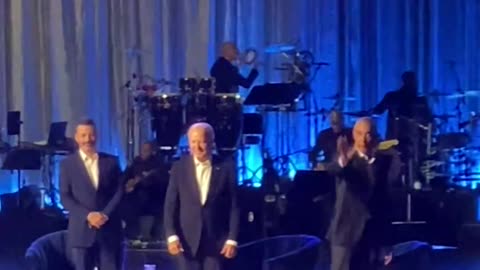 Joe Biden in catatonic state and BHO grabs him and escorts him from stage.