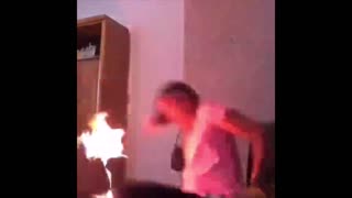 Chick doing hand stand dance gets knocked over and catches fire.