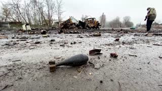 Relatives retrieve body of dead Ukrainian civilian