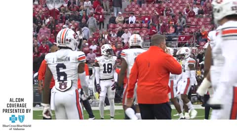 Cadillac Williams takes the field for warmups ahead of the Iron Bowl; shakes hands with Nick Saban