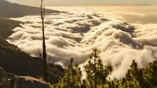 A magical sunset over a sea of clouds filmed in timelapse by Tristan Heth.