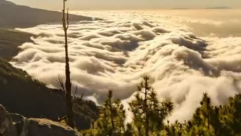 A magical sunset over a sea of clouds filmed in timelapse by Tristan Heth.