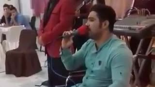 Mojtaba Forghani, the wrestler, singing a song