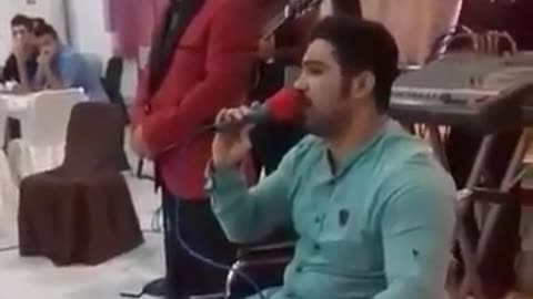 Mojtaba Forghani, the wrestler, singing a song