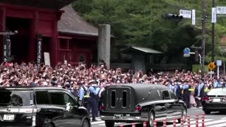 Hearse with Shinzo Abe's body passes through Tokyo