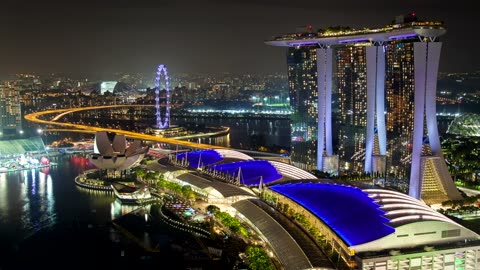 Singapore cityscape and harbor at night