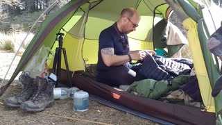 Vlog in the tent while getting her ready for a hike..