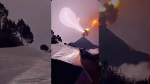 Lightning strikes erupting volcano