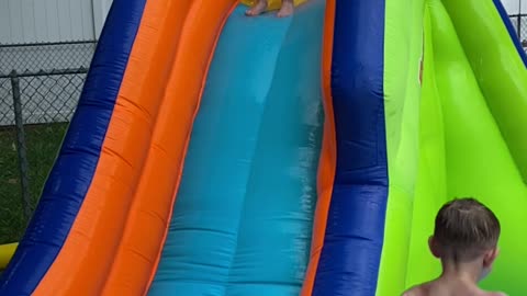 Nephew Jumps From Top of Inflatable Slide to the Ground