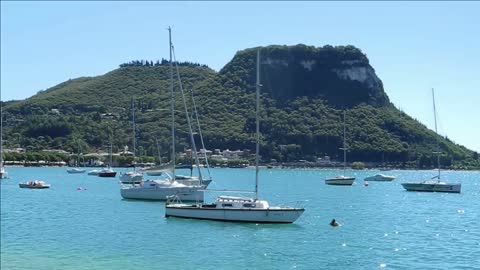 garda italy august 2012 boats moored in the blue lake on a sunny day