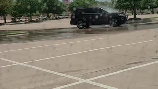 Cars Line Up For Free Car Wash