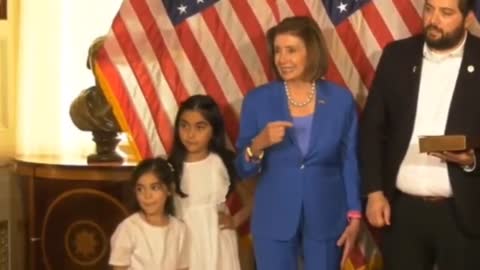 Racist Pelosi Shoves a Minority Child