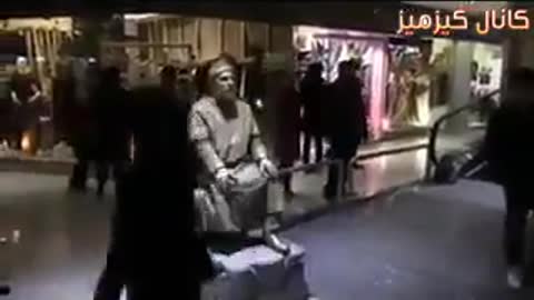 Living statue prank in a shopping centre in Mashhad ,Iran