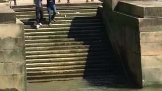 Guy Experiences A Solid Fall Down Some Slippery Steps On The Thames River