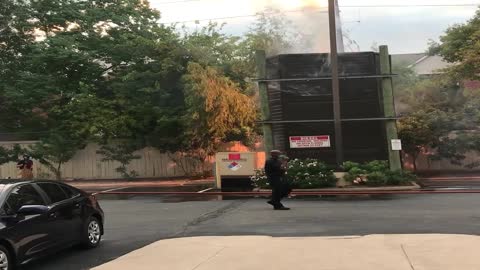 Power Box Sparks Up in Flames Next To Hotel