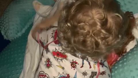 Brilliant idea cute twin fluffs his sister like a pillow to sleep