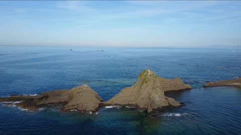 aerial view from the rocky coast of saturraran beach in spain