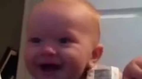 Baby Laughs At Mommy Hitting Daddy