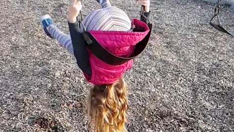Young Girl Gets Destroyed After She Attempts Mind-Blowing Flip Off Swing Set