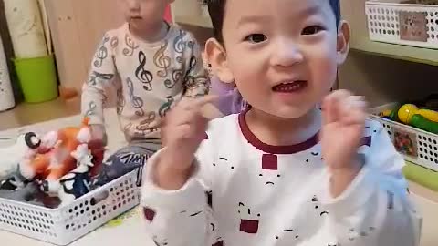 This is a video of a baby dancing happily to music.