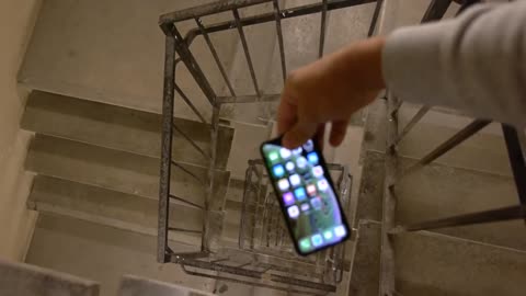 Dropping and iphone xs down crazy spiral sraicase 300 case