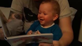 Baby Boy Can't Stop Giggling During Bedtime Story