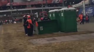 Broncos fan allegedly kicks over Porta-Potty with Patriots fan inside