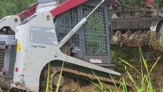 KUBOTA TRACTOR PULLS TAKEUCHI TRACKLOADER from a MUDDY PIT