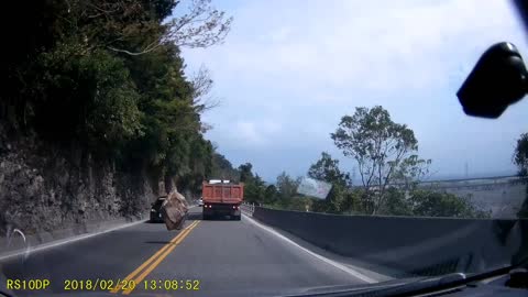 Falling Boulder Nearly Hits Multiple Cars
