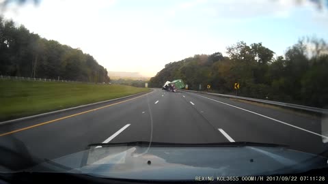 Semi Truck Tips Over While Driving on Interstate