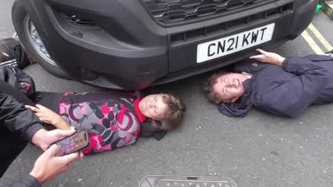 Extinction rebellion CHAINED TO A LORRY