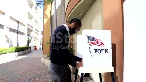 Millenial Black Man Voting in Election
