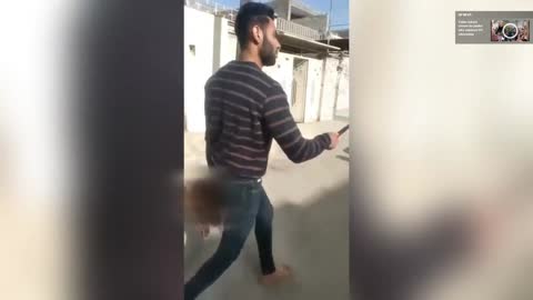 (GRAPHIC) Smiling Iranian man walks down street w/ wife's severed head.