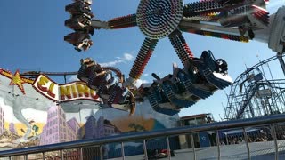 People Stuck Mid Air as Fair Ride Fails