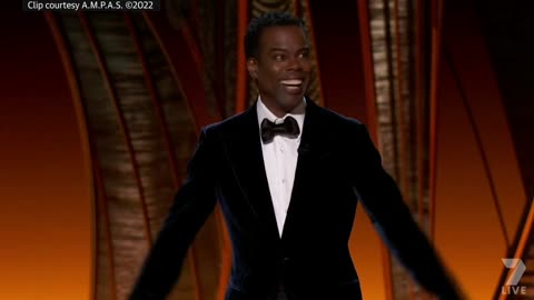 Watch the uncensored moment Will Smith smacks Chris Rock on stage at the Oscars