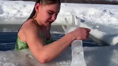girl playing with ice