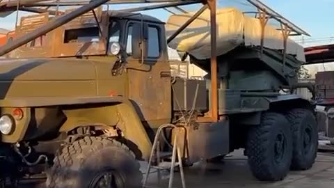 Modification of BM-21 Grad MLRS with protective screens and extra armour plates due to drone attacks