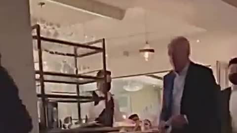 "Rules for thee but not for me" - President Biden walks through restaurant with no mask on