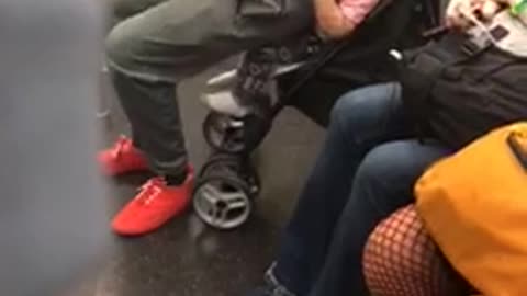 Red shirt sweats lady twerking dancing on baby in stroller