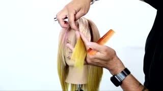 Learn how to create a Modern Shag Haircut with Curtain Bang