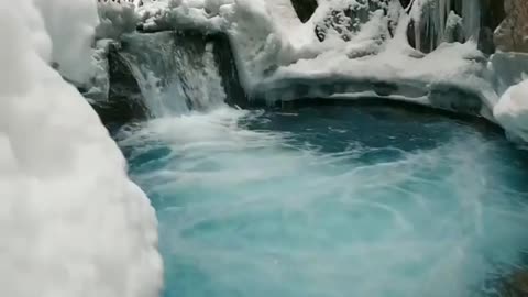 This amazing freezed hidden river in the mountains of alaska is quite the beautiful destination